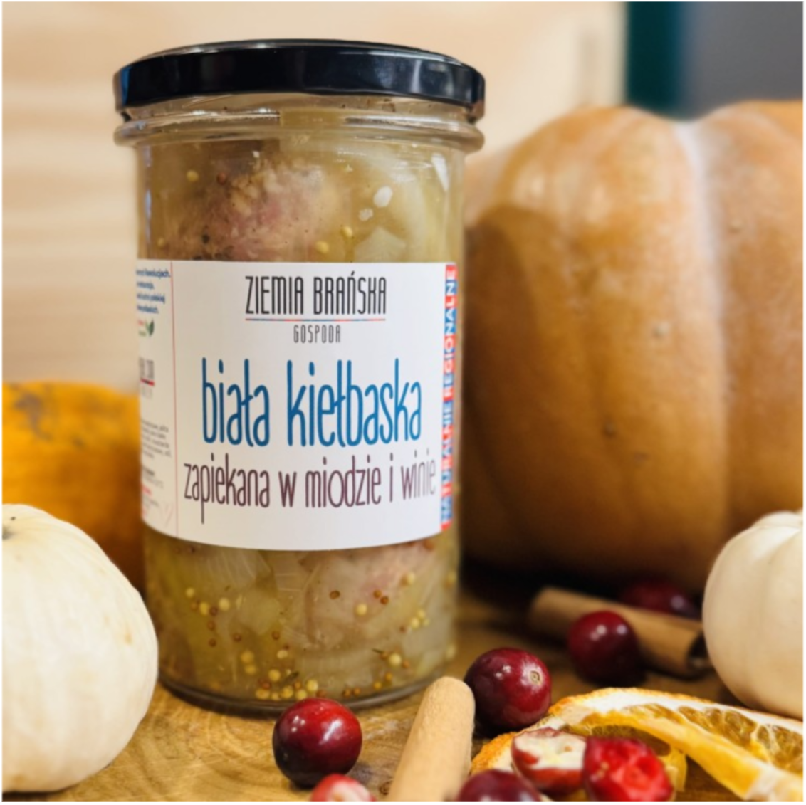 Biała kiełbasa zapiekana w winie i gorczycy